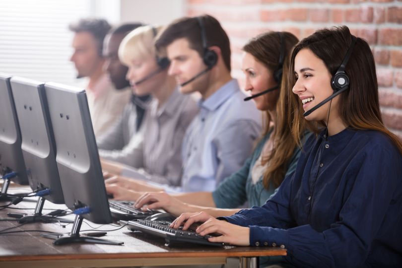 A customer support team working in an office