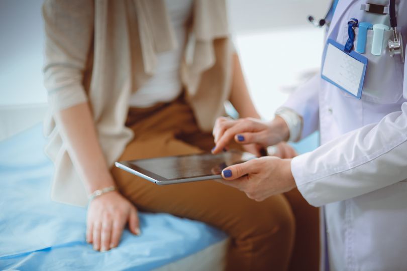 Doctor with patient