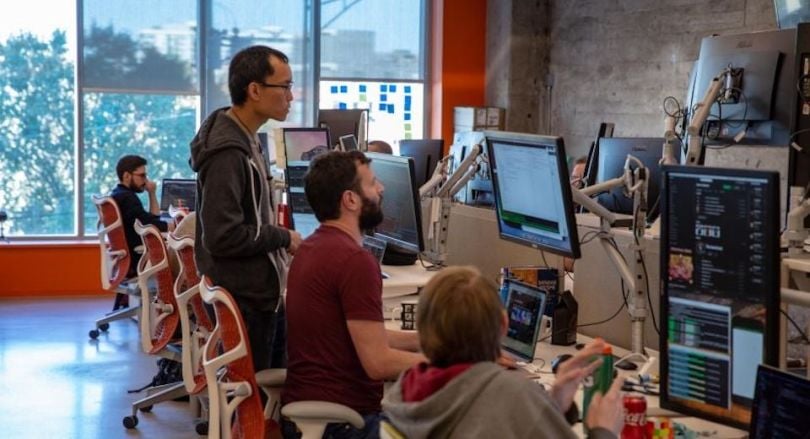 Tastytrade staff working at their computers