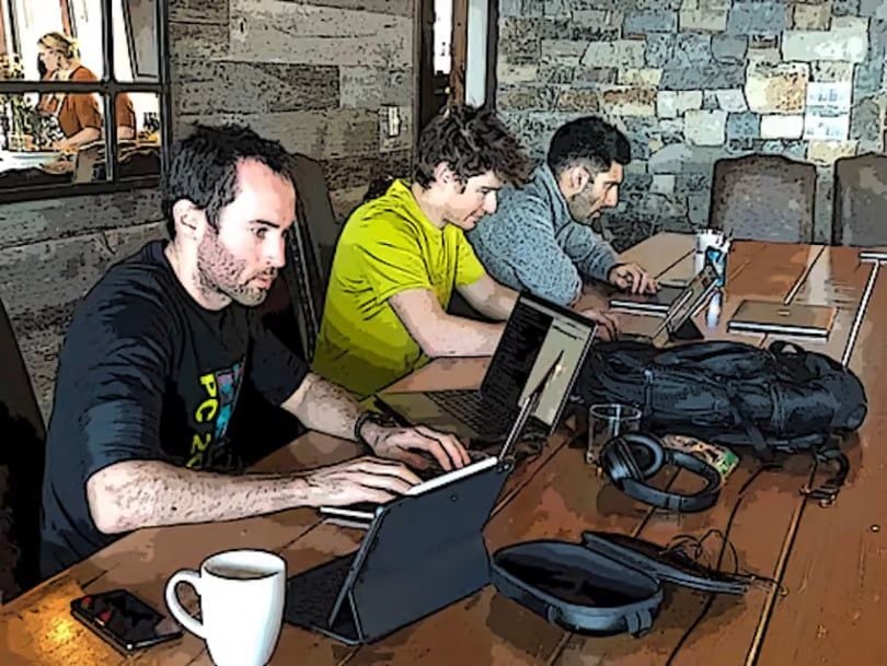Unit 410 team members working together in a coffee shop
