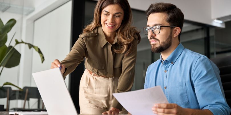 Employees on computer.